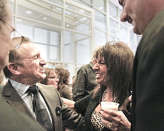 MADELYN P. HASTINGS | THE VINDICATOR

Ray "Boom Boom" Mancini laughs with old friend, Patty Barbone-Santarelli at the premier of "The Good Son".