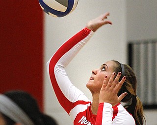 MADELYN P. HASTINGS | THE VINDICATOR

Casey D'Ambrose hits the ball during the YSU Loyola game.
