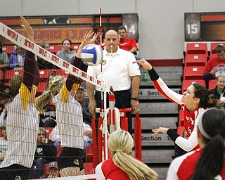 MADELYN P. HASTINGS | THE VINDICATOR

Shannon Watson hits the ball over the net during the YSU Loyola game.
