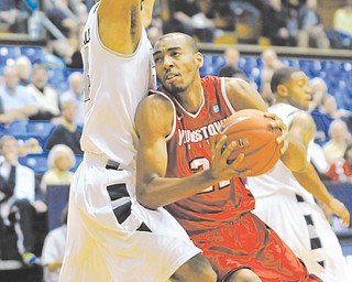 Youngstown State’s Damian Eargle (21) is 15 blocks away from YSU’s all-time record, but unlike the past few seasons, he’ll have a little more help in the post this winter.