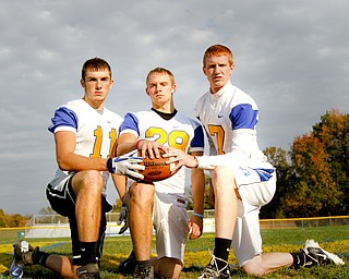 MADELYN P. HASTINGS | THE VINDICATOR
(L-R) Jared Shilot, JJ Napierkowski, and Luke Griffith pose for a portrait on their field at Southern Local High School.