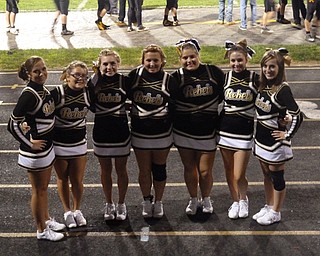 The Varsity Rebel cheerleaders: Lauren, Taylor, Alexis, Tiff, Amber, Chelsea, and Erika take a moment to pose on the track