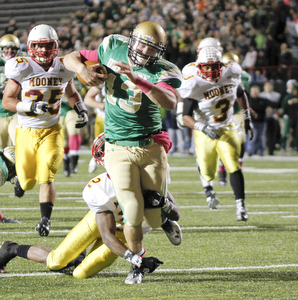            ROBERT K. YOSAY  | THE VINDICATOR..Big Gain as Ursulines  #13 Chirs Durking runs 50+ yards to set up an Ursuline TD and Ursuline never looked back .. trying to tackle is Mooney #2  Kareem Ellis  behind them #35   Anthony Dermotta  and #3  C J Bias Mooney @  Ursuline  YSU Stadium - Ursuline won 44-24 -... - -30-..