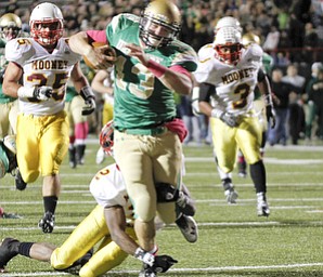 ROBERT K. YOSAY | THE VINDICATOR..Big Gain as Ursulines #13 Chirs Durking runs 50+ yards to set up an Ursuline TD and Ursuline never looked back .. trying to tackle is Mooney #2 Kareem Ellis behind them #35 Anthony Dermotta and #3 C J Bias Mooney @ Ursuline YSU Stadium - Ursuline won 44-24 -... - -30-..