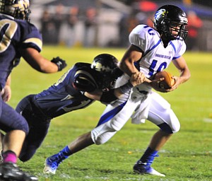 Youngtsown Christian quarterback #10 Emmett Underwood is sacked by Brookfield'd #10 Ron Kirilla.