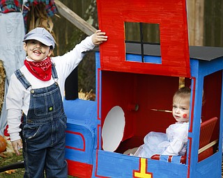 MADELYN P. HASTINGS | THE VINDICATOR
T.J. Sturgiss, 3, revels his cousin Natalie Sturgiss, 2, in his train costume at the Spooktacular Funfest in Millcreek Park on October 20, 2012.