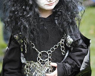 MADELYN P. HASTINGS | THE VINDICATOR
Vincent Clark, 3, of Youngstown dresses as Gene Simmons at the Spooktacular Funfest in Millcreek Park on October 20, 2012.