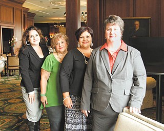 OCCHA will be celebrating 40 years of service during a scholarship banquet Friday at Mr. Anthony’s Banquet Center. Among those involved with the event are Atty. Miriam Ocasio, board president, left; Virginia Hernandez and Maria Olverson, gala committee co-chairwomen; and Susan Nieves, executive director. Photo by: ROBERT K. YOSAY | THE VINDICATOR.