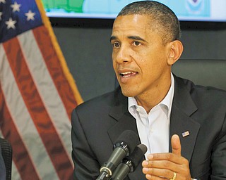 President Barack Obama speaks to the media about Hurricane Sandy at the Federal Emergency Management
Agency in Washington on Sunday. Obama will forgo appearing with former President Bill Clinton at the Covelli
Centre today. Vice President Joe Biden will join Clinton for the campaign event.