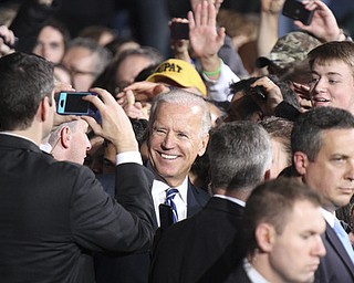 William d Lewis the vindicator   Joe Bidenposes for a photo during rally 102912 at Covelli.
