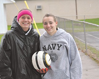 Kaylee Buchenic, left, and Jen Morris are senior captains on the Canfield girls soccer team. Buchenic and Morris have been varsity players since they were freshman. They’ve been a part of three district championship teams. Now, the Cardinals gear up for the Division II regional tournament. They face Hathaway Brown tonight in Ravenna.