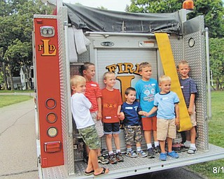 The Logan Brooke neighborhood in Liberty Township recently enjoyed its annual block party and were treated to a visit by the township’s fire department. Kids of all ages learned about the firetruck and ambulance vehicles. Standing on the truck are, from left, Ethan Brookbank, Gregory Jones, Will and Matt Hynes, Anthony Garano and James and Patrick Jones.