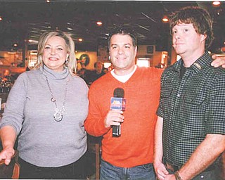 Among those involved in planning the Awesome Aussie luncheon that will benefit Hospice of the Valley are, from left, Liz McGarry, director of development of Hospice of the Valley; Mike Case, WFMJ-TV 21; and Jim Farrell, proprietor of The Outback Steakhouse, Boardman.