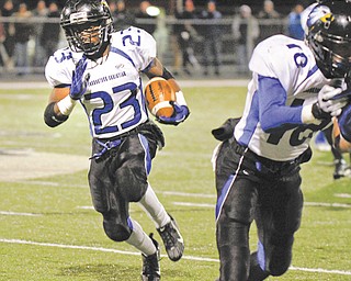 Youngstown Christian running back Ryan Grier (23) becomes an animal once he straps on his black Eagles
helmet, fastens the chin strap and hits the field. Greir has racked up 14 rushing TDs and 1,315 rushing yards for Eagles, who face Malvern on Friday in the Division VI, Region 21 semifinal at Akron St. Vincent-St. Mary’s Green Stadium.