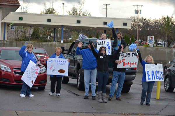 Fans lined the streets of Hubbard to watch as the Safety Forces of Hubbard escorted them through town on their way to their playoff game in Niles.  
