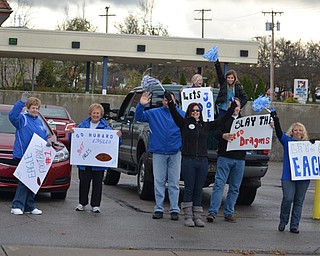 Fans lined the streets of Hubbard to watch as the Safety Forces of Hubbard escorted them through town on their way to their playoff game in Niles.