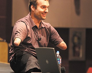 Motivational speaker Kyle Maynard, 26, addressed students from six school districts Wednesday during assemblies at South Range and Salem schools.