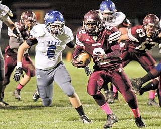 Three months ago, Sherron Walls (2) and his Liberty teammates had a new coach and were on an 18-game losing
streak. Nobody was thinking about freezing through practice in the second round of playoffs. After winning their
first playoff game since 2005 last weekend, the Leopards’ rags-to-riches story continues with a meeting with state champs Creston Norwayne in the Division IV, Region 13 regional semifinal at Uniontown Lake High School.