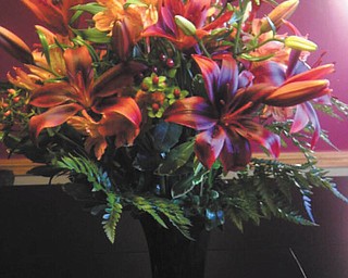 Joyce Howard of Boardman took this picture of a floral bouquet of starfires and other fall flowers that was sent to her by son and his wife, both in the Air Force in Texas, when she had surgery recently.