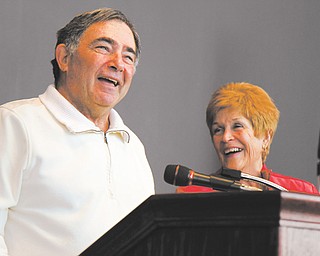Howard Hartzell speaks to the recipients of the 2012 Michael T. Hartzell Memorial Scholarship at a luncheon at Youngstown State University’s DeBartolo Stadium Club. He was joined Tuesday at the rostrum with his wife, Mary Kay. The scholarship is named after their son, a Youngstown police officer killed in the line of duty in April 2003.