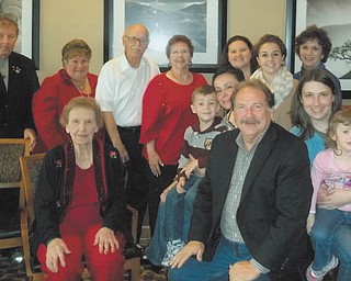 The family of Elsie Sheppard recently celebrated her 95th birthday with a get-together at Holiday Inn, Boardman. She also celebrated with her Red Hat Society group, the Old Timers and her TOPS club. She also received birthday wishes from radio station 1570 AM. Seated in front is Sheppard, her son, Ken Veisz; Keaton, Ashley, Max, Lori, Kamiren and Pat Veisz; Clarissa Whippo; daughter, Carol Bovee; Harry Bovee; Donna Graham and son, Bud Graham.