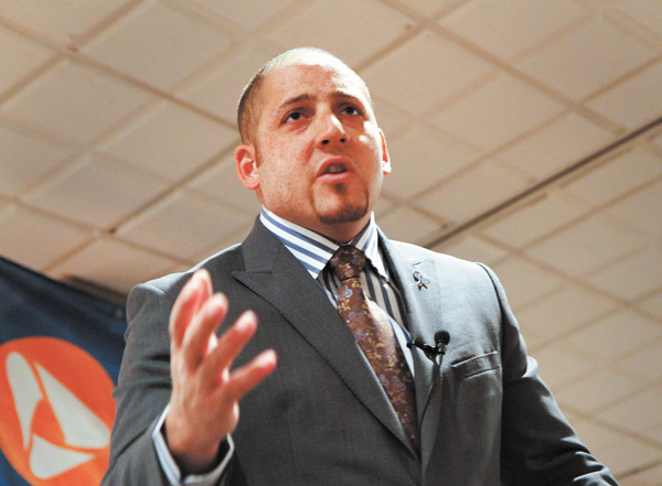 Kevin Hines, one of a few people who survived a suicide attempt by jumping from the Golden Gate Bridge in San Francisco, speaks at a suicide-prevention workshop at Antone’s Banquet Center, Boardman.