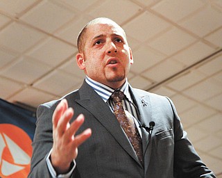 Kevin Hines, one of a few people who survived a suicide attempt by jumping from the Golden Gate Bridge in San Francisco, speaks at a suicide-prevention workshop at Antone’s Banquet Center, Boardman.