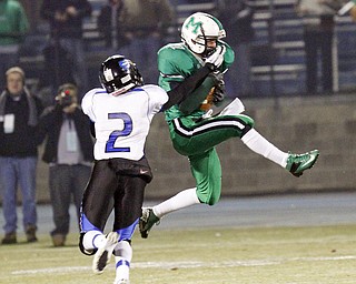 ROBERT K. YOSAY | THE VINDICATOR --..#2 Darien Townsend tries to break up a pass for 40+ yards to #36 Gary Strain during second quarter action - .YCS vs Mogadore at Ravenna...(AP Photo/The Vindicator, Robert K. Yosay)