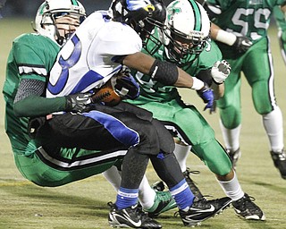 ROBERT K. YOSAY | THE VINDICATOR --..YCS Ryan Grier is stopped by Mogadores # 82 Kasey Beard and #92 (underneath Matt Nolfi during first quarter action -..YCS vs Mogadore at Ravenna...(AP Photo/The Vindicator, Robert K. Yosay)