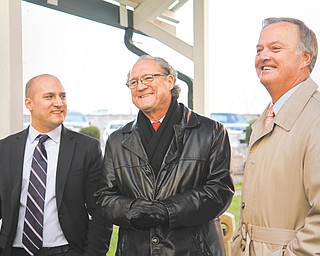 State Reps. Robert Hagan of Youngstown, D-60th, center, and Ronald V. Gerberry of Austintown, D-59th, right, are introducing a bill today to abolish the third Youngstown municipal judge seat. State Sen. Joe Schiavoni of Boardman, D-33rd, left, said he will support the legislation once it reaches the state Senate.