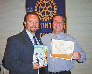 Doug Gough, men’s services client adviser from Rescue Mission of Mahoning Valley, was the guest speaker at a recent meeting of the Austintown Rotary. Since 1893, the Rescue Mission has sheltered the homeless and fed the hungry. Shown with Rotary President-elect Mark Cole is Doug Gough receiving a certificate for a book to be donated to the Woodside Reads Project. For information or to offer aid, call the Rescue Mission at 330-744-5486 or visit 2ndChance@RescueMissionMV.org.