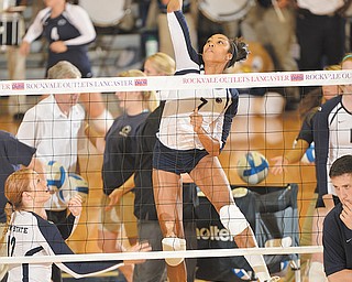 Howland graduate Nia Grant (7) goes up for a kill during a recent match. Grant, a sophomore, is a starter at middle hitter for Penn State. The Nittany Lions are a perennial NCAA power and are ranked No. 2 this season.