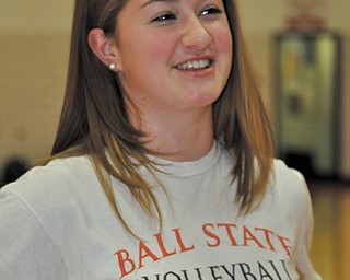 Canfield senior Sabrina Mangapora talks with reporters after signing a letter-of-intent with Ball State University.