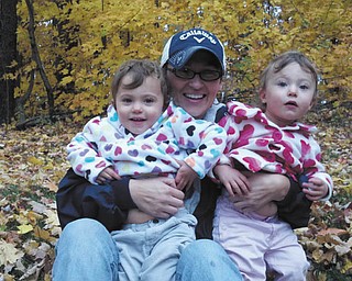 Gianna Duponty with twin daughters Olive and Ellie.