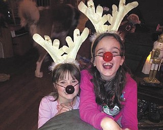 Nancy Fawcet of Canfield sent this is a picture of her two little reindeer, granddaughters Becca Geissler (8) and Lorelai Geissler (6).