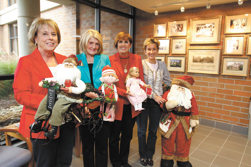 
The Holiday Hopes and Wishes committee  prepares for the Dec. 14 luncheon, bake shoppe and basket raffle to benefit Akron Children’s Hospital Mahoningn Valley at Mr. Anthony’s in Boardman. From left are Dynna Hayat, Betty Cmil, Julie Costas and Kathy Dwinnells. PHOTO BY: ROBERT K. YOSAY  | THE VINDICATOR
