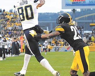 San Diego Chargers wide receiver Malcom Floyd (80) catches the ball for a touchdown in front of Pittsburgh
Steelers cornerback Keenan Lewis (23) in the third quarter of an NFL game Sunday in Pittsburgh. The Chargers won 34-24.