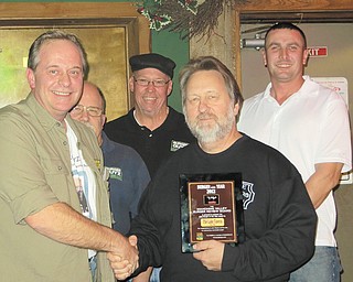 JT presents Lake Tavern owner John Palasics with the Burger Guys’ 2012 Burger of the Year Award as Johnny, Scott and Eric look on.