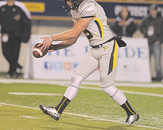 Junior Vince Penza, shown in action during a game against Cincinnati on Oct. 20, will handle the punting
duties for the Toledo Rockets against Utah State in the Famous Idaho Potato Bowl on Saturday. Penza, a
Cardinal Mooney High School graduate, averages 40.6 yards per punt for Toledo (9-3).
