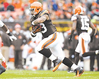 Browns running back Trent Richardson runs the ball against the Kansas City Chiefs during Sunday’s
game in Cleveland.