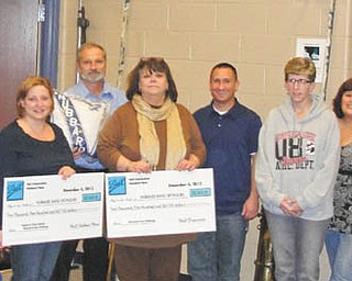Hubbard Schools Band Sponsors won an aluminum can fund drive sponsored by the Ball Corp. for the third year in a row. Representatives from the local Ball Corp. plant in Hubbard were on hand at a recent boosters meeting to present the members with a check for $2,500 along with a check for an additional $2,500 of matching funds from the local plant. The Hubbard Band Sponsors have received over $10,000 in the last three years from the Ball Corp. All money goes into a fund for new uniforms. Pictured are, from left,  Ball personnel Amy Braden, Gary Flamino and Bob Truckiss; Andrea Lewis, assistant band director; Bernie Grilli, Ball Corp.; Cathy Cummings, boosters president; Dan Nestich, school band director; Pam Reiter, boosters vice president; Sandy Kerr, boosters treasurer; Ron Emch, boosters secretary; Chet Julian, Ball Corp.; and Sal Halicki and Maria Castner, boosters trustees.
