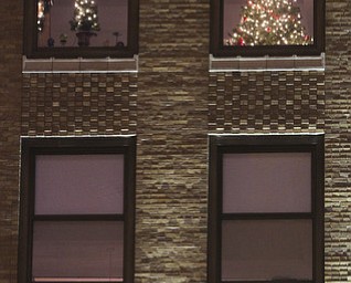 William d LEwis The Vindicator Christmas tree in window of Realty Tower.