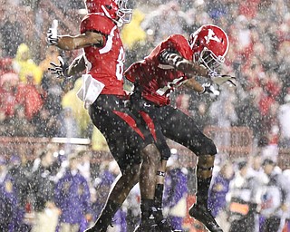 Willim D. Lewis the Vindicator   YSU's Andrew Williams(80), left, and Marcel Carver(16) react after Williams scored  the second YSU TD of the game during 1rst qtr agaisnt UNI Saturday.