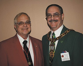 At the recent annual conventions of their respective bodies, James A. Streeky, left, was installed as the district education officer of the 19th District of the Grand Chapter of Royal Arch Masons of Ohio. A past officer of the local chapter, he will assist chapters in northeast Ohio in various programs. Richard J. Brady, who has served as a local and district officer, now assumes the leadership of more than 9,500 members of the Grand Commandery Knights Templar of Ohio. Photo: SPECIAL TO THE VINDICATOR