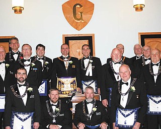 Argus Lodge 545, Free and Accepted Masons, installed elected officers for 2013 during the 127th annual installation ceremony Dec. 14. Officers were installed by James F. Easterling Jr., Grand Master of Masons in Ohio. The meeting was preceded by a dinner served by Eric’s Catering and a party followed at the home of Russell W. Gillam Jr. In front from left are R. Patrick Anderson, junior steward; Ryan Hamilton, senior deacon; Charles Prachick, junior deacon; and Eric Cahalin, senior steward. In back are Denny Furman, lodge education officer; Mark Roca, senior warden; Russell W. Gillam III, treasurer; R. Christopher Gillam, chaplain; Easterling; Russell W. Gillam Jr., master; Dale E. Hawkins, junior warden; Thomas White; John Martin; Donald Huntley, secretary; and Wilmer K. Jones, tyler. The lodge was chartered in Canfield in 1886.