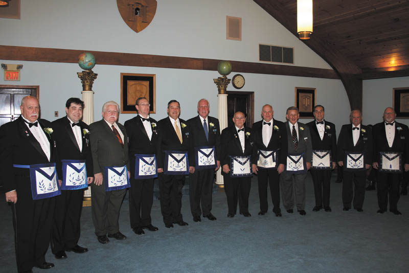 At a recent meeting of Canfield Argus Lodge, Past Masters assembled to receive the Grand Master of Masons of Ohio, James F. Easterling Jr. From left with year as master of the lodge are Thomas J. Haliden, 2001 and 2012; R. Christopher Gillam, 2010; George E. Brainard, 2007; Russell W. Gillam III, 1996; Mark D. Stovall, 1990; Gregory B. Anstrom, 1986; Donald L. Huntley, 1985; Eric Cahalin, 1983; Elmer J. Stalnaker Jr., 1981; Russell W. Gillam Jr., 1979; Emanual J. Cominos, 1974; and Dale E. Hawkins, 2003.