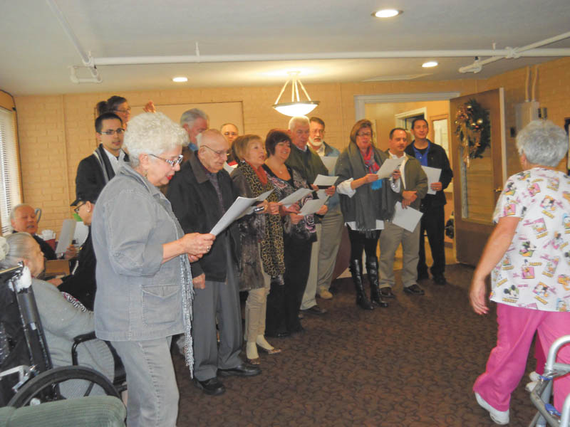 Struthers Rotary members visited Maplecrest Nursing Home, 400 Sexton St., Struthers, recently and entertained residents with Christmas carols. They were led by Rotarian Mary Ann Morell.