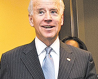 Vice President Joe Biden arrives for a closed-door meeting with House Democrats, on Capitol Hill in Washington on Tuesday to discuss the fiscal cliff bill. Biden had been shuttling between the White House and Capitol Hill to help with negotiations.