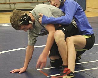 William D Lewis the Vindicator Hubbard sophomore wrestler Shirley Flynn wrestles C.J. Latronico, a Hubbard freshman in the 106 pound class during a recent practice. She is one of just a few girl wrestlers in the state.