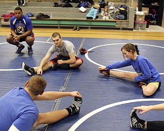 William D Lewis the Vindicator Hubbard sophomre wrestler Shirley Flynn warms up before a recent practice. She is one of just a few girl wrestlers in the state.